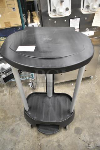 Rubbermaid Poly Trash Can Shell on Commercial Casters.