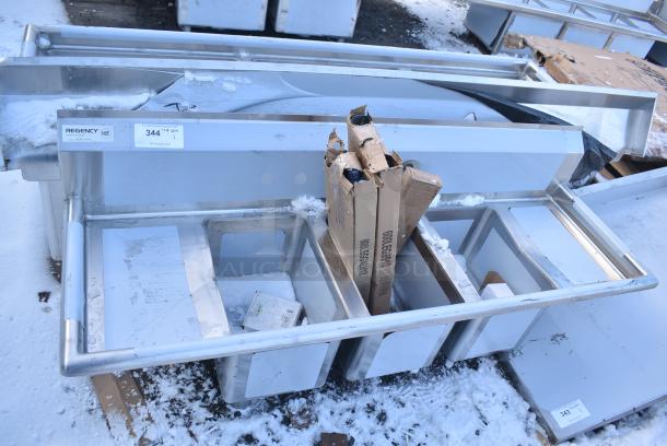 BRAND NEW SCRATCH AND DENT! Regency 600S31014212 58" 16-Gauge Stainless Steel Three Compartment Commercial Sink with Galvanized Steel Legs and 2 Drainboards - 10" x 14" x 10" Bowls - Image 1 of 7