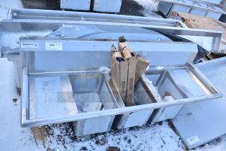 BRAND NEW SCRATCH AND DENT! Regency 600S31014212 58" 16-Gauge Stainless Steel Three Compartment Commercial Sink with Galvanized Steel Legs and 2 Drainboards - 10" x 14" x 10" Bowls
