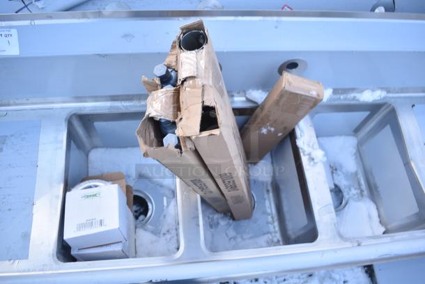 BRAND NEW SCRATCH AND DENT! Regency 600S31014212 58" 16-Gauge Stainless Steel Three Compartment Commercial Sink with Galvanized Steel Legs and 2 Drainboards - 10" x 14" x 10" Bowls - Image 5 of 7