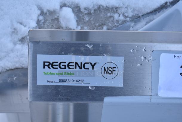 BRAND NEW SCRATCH AND DENT! Regency 600S31014212 58" 16-Gauge Stainless Steel Three Compartment Commercial Sink with Galvanized Steel Legs and 2 Drainboards - 10" x 14" x 10" Bowls - Image 7 of 7