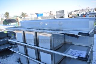 BRAND NEW SCRATCH AND DENT! Regency 600S31620224 100" 16 Gauge Stainless Steel Three Compartment Commercial Sink with Galvanized Steel Legs and 2 Drainboards - 16" x 20" x 12" Bowls. No Legs.