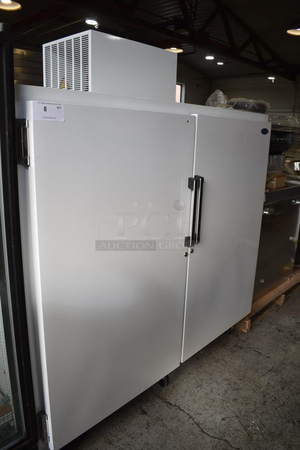 BRAND NEW SCRATCH AND DENT! Norlake GR422WVW/0 Metal Commercial 2 Door Reach In Bulk Storage Cooler w/ Poly Coated Racks on Commercial Casters. 115 Volts, 1 Phase. Tested and Does Not Power On - Image 1 of 7