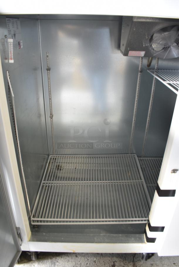 BRAND NEW SCRATCH AND DENT! Norlake GR422WVW/0 Metal Commercial 2 Door Reach In Bulk Storage Cooler w/ Poly Coated Racks on Commercial Casters. 115 Volts, 1 Phase. Tested and Does Not Power On - Image 4 of 7