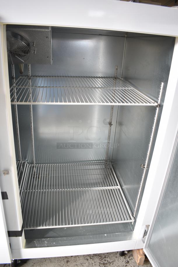 BRAND NEW SCRATCH AND DENT! Norlake GR422WVW/0 Metal Commercial 2 Door Reach In Bulk Storage Cooler w/ Poly Coated Racks on Commercial Casters. 115 Volts, 1 Phase. Tested and Does Not Power On - Image 5 of 7