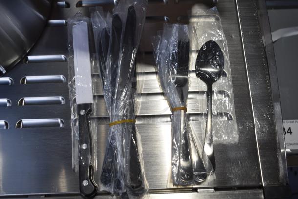BRAND NEW SCRATCH AND DENT! Lot of Utensils Including Spoons and Lifters - Image 1 of 3