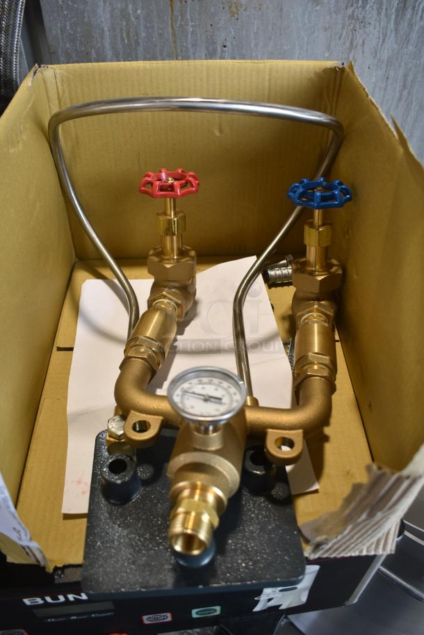 BRAND NEW SCRATCH AND DENT! Regency 600HCWWS Hot and Cold Mixing / Washdown Station with Mixing Valve, Hose Rack, and Thermometer, 27040235 Continental Refrigerator 40235 Defrost Timer, 2404523006 Garland / US Range CK4603990 Sit Oven Control 1.0Mm - Image 1 of 14