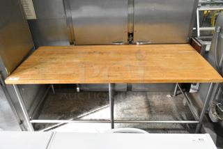 Butcher Block Table on Metal Legs.