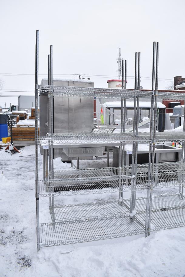 Chrome Finish 4 Tier Wire Shelving Unit. BUYER MUST DISMANTLE. PCI CANNOT DISMANTLE FOR SHIPPING. PLEASE CONSIDER FREIGHT CHARGES. - Image 1 of 3