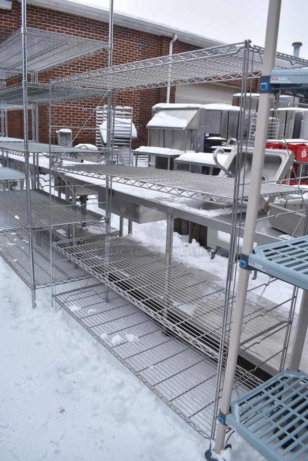Chrome Finish 4 Tier Wire Shelving Unit. BUYER MUST DISMANTLE. PCI CANNOT DISMANTLE FOR SHIPPING. PLEASE CONSIDER FREIGHT CHARGES. - Image 1 of 4
