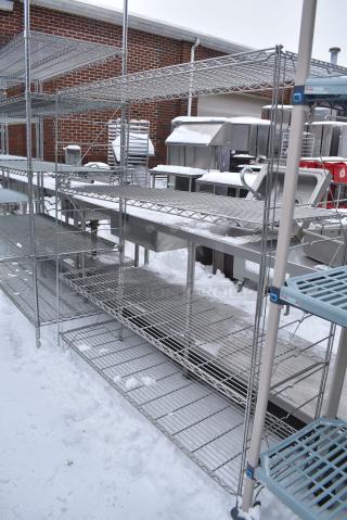 Chrome Finish 4 Tier Wire Shelving Unit. BUYER MUST DISMANTLE. PCI CANNOT DISMANTLE FOR SHIPPING. PLEASE CONSIDER FREIGHT CHARGES.