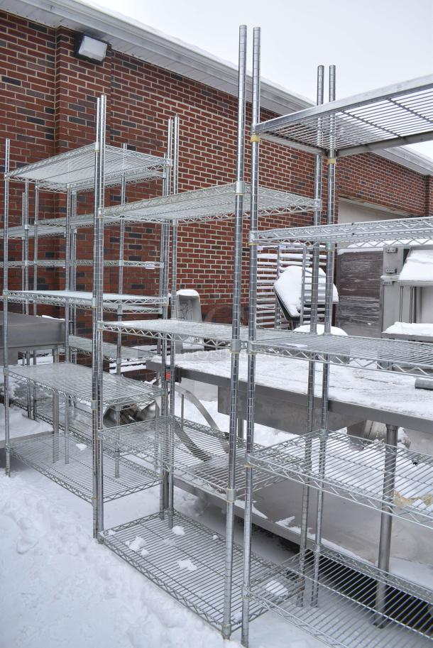Chrome Finish 4 Tier Wire Shelving Unit. BUYER MUST DISMANTLE. PCI CANNOT DISMANTLE FOR SHIPPING. PLEASE CONSIDER FREIGHT CHARGES. - Image 1 of 4