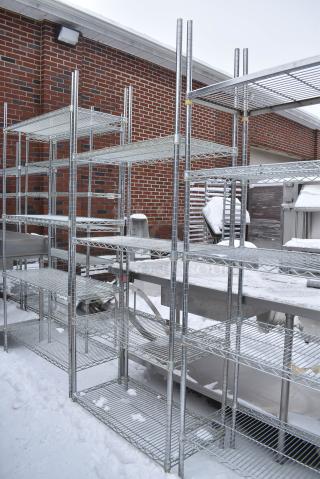 Chrome Finish 4 Tier Wire Shelving Unit. BUYER MUST DISMANTLE. PCI CANNOT DISMANTLE FOR SHIPPING. PLEASE CONSIDER FREIGHT CHARGES.