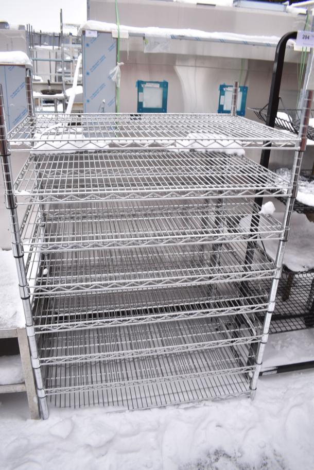 Chrome Finish 8 Tier Wire Shelving Unit. BUYER MUST DISMANTLE. PCI CANNOT DISMANTLE FOR SHIPPING. PLEASE CONSIDER FREIGHT CHARGES. - Image 1 of 3
