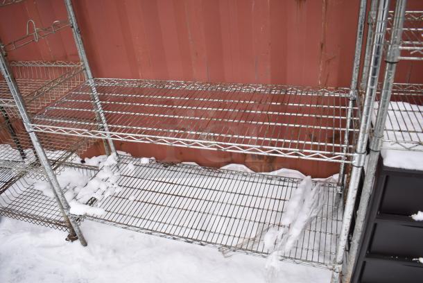 Chrome Finish 4 Tier Wire Shelving Unit w/ Contents. BUYER MUST DISMANTLE. PCI CANNOT DISMANTLE FOR SHIPPING. PLEASE CONSIDER FREIGHT CHARGES. - Image 4 of 5