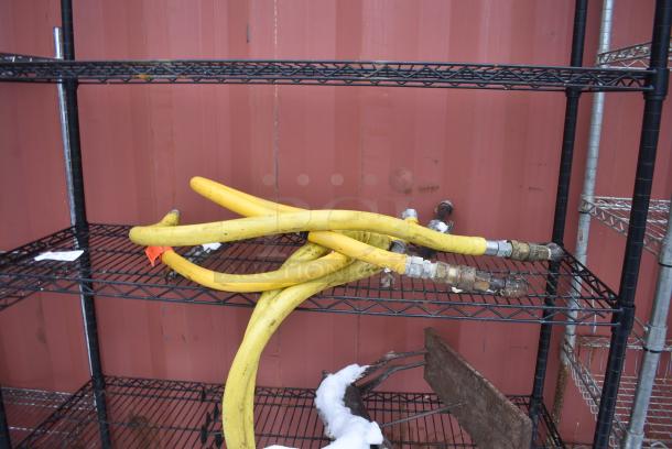 Black Finish 4 Tier Wire Shelving Unit w/ Contents Including Gas Hoses. BUYER MUST DISMANTLE. PCI CANNOT DISMANTLE FOR SHIPPING. PLEASE CONSIDER FREIGHT CHARGES. - Image 4 of 4