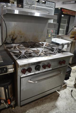 Vulcan Stainless Steel Commercial Natural Gas Powered 6 Burner Range w/ Oven, Over Shelf and Back Splash.