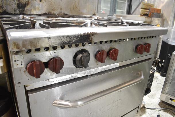 Vulcan Stainless Steel Commercial Natural Gas Powered 6 Burner Range w/ Oven, Over Shelf and Back Splash. - Image 4 of 5
