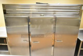 Traulsen RRI 3-32 LUT Stainless Steel Commercial 3 Door Roll In Rack Cooler. 115/208 Volts, 1 Phase.