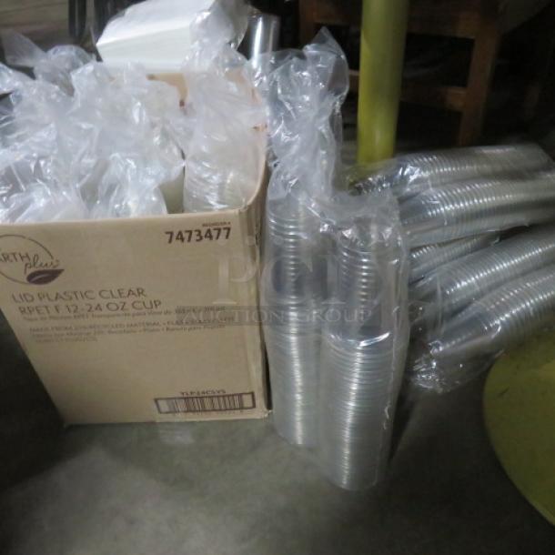 One Lot Of Clear Cups And Lids. - Image 1 of 1