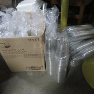 One Lot Of Clear Cups And Lids.