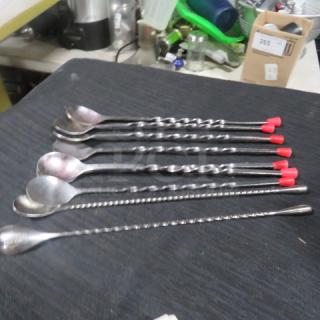 One Lot Of 9 Swizzel Spoons.