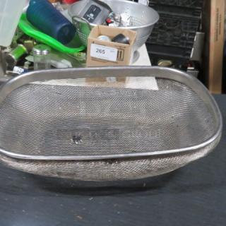 One SS Strainer Basket.