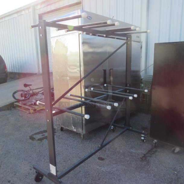 One Portable Chair Mover  On Casters. 66X30X70 - Image 1 of 1