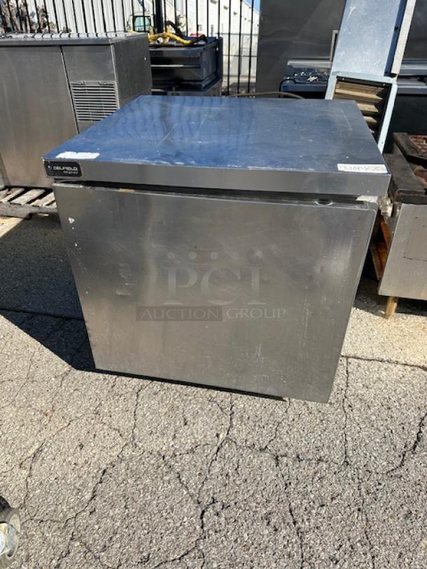 One WORKING Delfield 1 Door Worktop Cooler With 2 Racks, On Casters. Model# GUR32P-S-10 115 Volt. 32X30X34 - Image 1 of 2