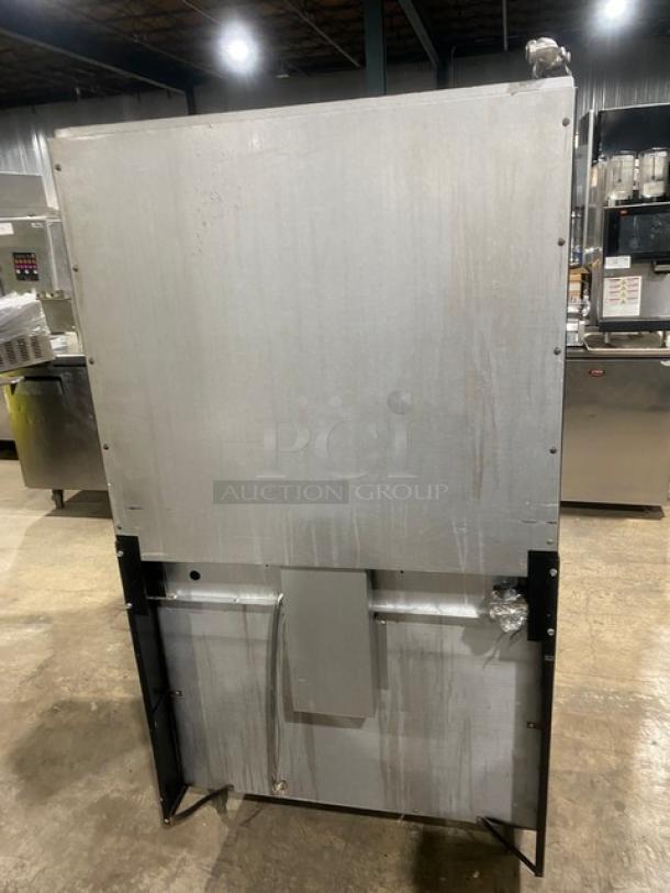 Garland Commercial Stainless Steel Natural Gas Powered 4 Burner Range/Center Flat Griddle & Oven Combo! With Back Splash & Garland Natural Gas Powered Overhead Salamander Broiler/Cheese Melter! On Legs! - Image 4 of 10
