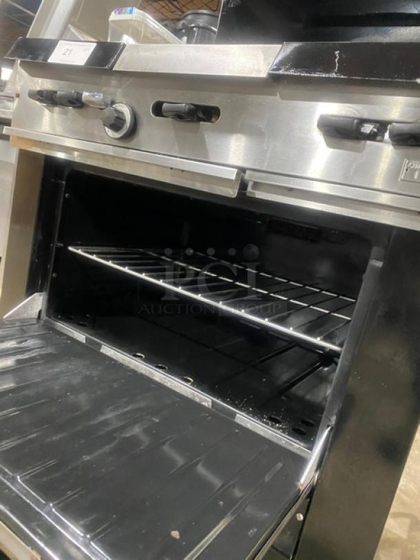 Garland Commercial Stainless Steel Natural Gas Powered 4 Burner Range/Center Flat Griddle & Oven Combo! With Back Splash & Garland Natural Gas Powered Overhead Salamander Broiler/Cheese Melter! On Legs! - Image 8 of 10