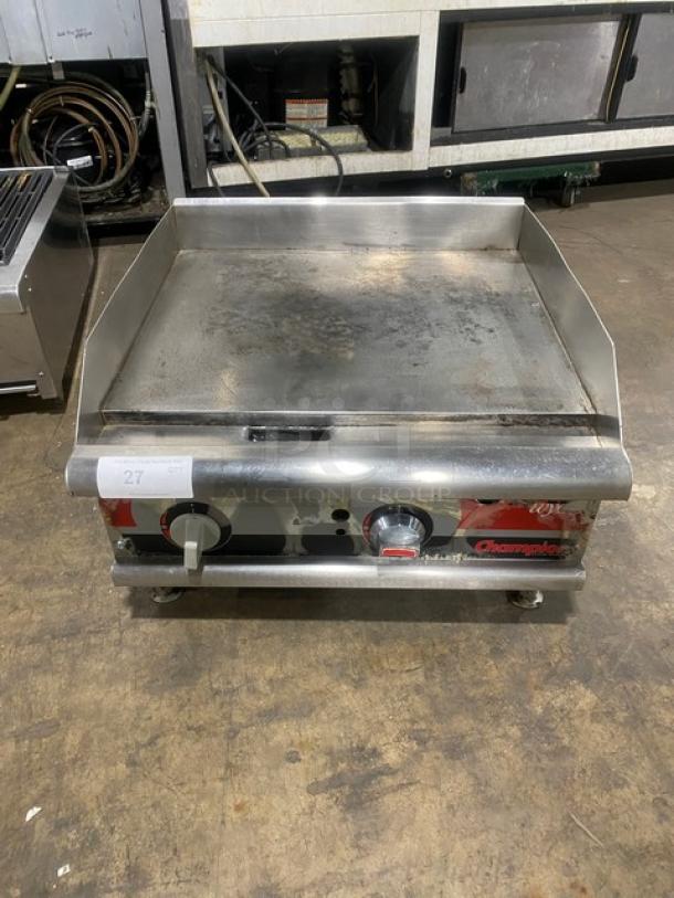APW Wyott Champion Cook Series Commercial Stainless Steel Natural Gas Powered 24" Countertop Flat Griddle! With 1" Thick Smooth Polished Steel Griddle Plate! With Back & Side Splash! With Snap-Action Thermostatic Controls! On Legs! - Image 1 of 7