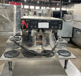 Bunn Commercial Stainless Steel Countertop Coffee Brewer! With 6 Warmers! With Hot Water Dispenser! With Brew Baskets! Model: AXIOM 0/6 TWIN SN: AXTN034443! 120/208-240V 1 Phase! On Legs!