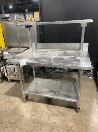 Commercial Stainless Steel Worktop Table! With Mini Turned Up Back Splash & Overhead Shelf! With Single Undershelf! On Casters!