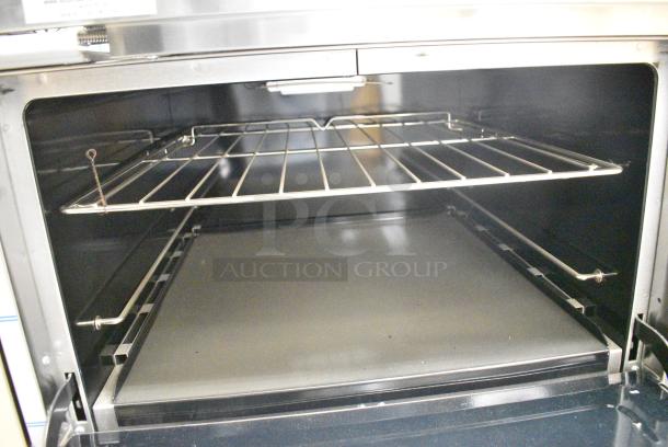 BRAND NEW SCRATCH AND DENT! Southbend 4601DD-2GR Stainless Steel Commercial Natural Gas Powered 6 Burner Range w/ Flat Top Griddle and 2 Ovens. - Image 9 of 12
