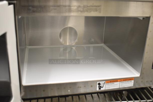 BRAND NEW SCRATCH AND DENT! 2024 Amana SWAHD12 Space Saver Heavy-Duty Stainless Steel Commercial Microwave with Push Button Controls. 120 Volts, 1 Phase. - Image 4 of 6