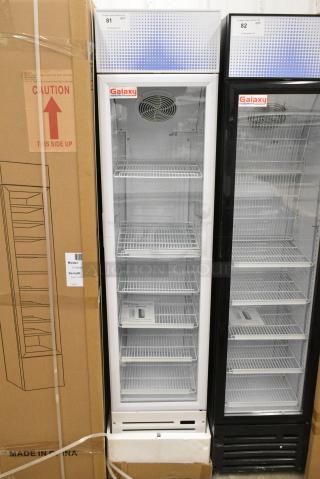 BRAND NEW SCRATCH AND DENT! Galaxy 177GDN5RBW Metal Commercial Single Door Reach In Cooler Merchandiser with Red, White, and Blue LED Lighting. 110-120 Volts, 1 Phase. Tested and Working!