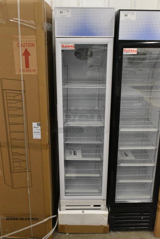 BRAND NEW SCRATCH AND DENT! Galaxy 177GDN5RBW Metal Commercial Single Door Reach In Cooler Merchandiser with Red, White, and Blue LED Lighting. 110-120 Volts, 1 Phase. Tested and Working! - Image 1 of 4