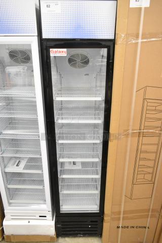 BRAND NEW SCRATCH AND DENT! Galaxy 177GDN5RBB Metal Commercial Single Door Reach In Cooler Merchandiser with Red, White, and Blue LED Lighting. 110-120 Volts, 1 Phase. Tested and Working!