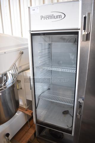 Premium Metal Commercial Single Door Reach In Cooler Merchandiser w/ Poly Coated Racks. 115 Volts, 1 Phase. Tested and Powers On But Does Not Get Cold