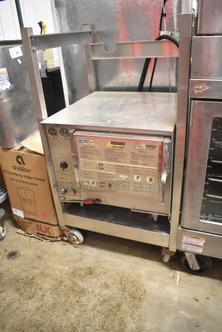 AccuTemp S32083D1205135 Stainless Steel Commercial Electric Powered Single Deck Steam Cabinet on Equipment Stand w/ Commercial Casters. 208 Volts, 3 Phase.