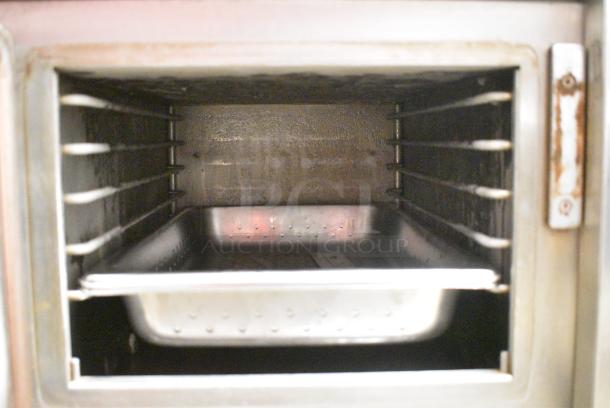 AccuTemp S32083D1205135 Stainless Steel Commercial Electric Powered Single Deck Steam Cabinet on Equipment Stand w/ Commercial Casters. 208 Volts, 3 Phase. - Image 6 of 10