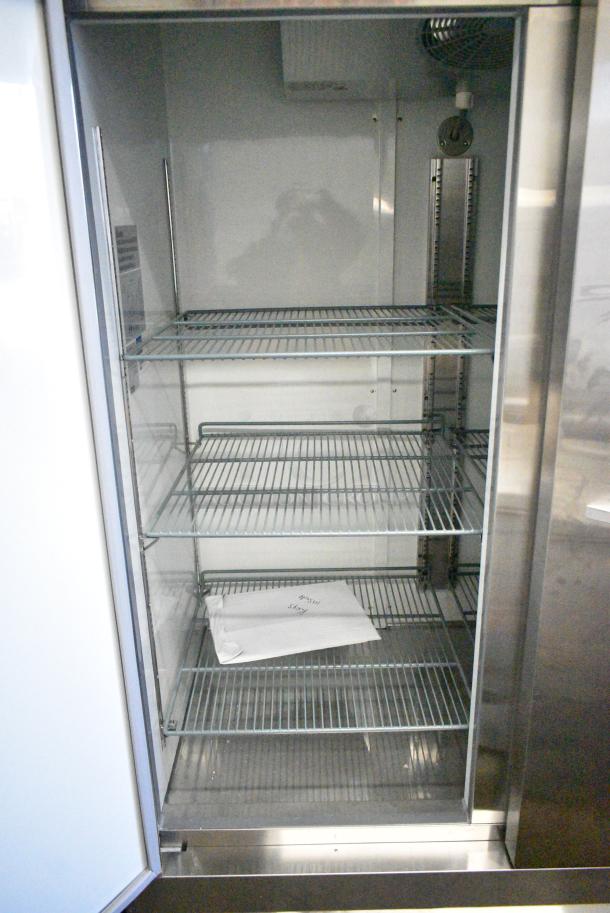 BRAND NEW SCRATCH AND DENT! 2024 Avantco 829BMR49R Stainless Steel Commercial 2 Door Reach In Cooler w/ Poly Coated Racks. 115 Volts, 1 Phase. Tested and Working! - Image 3 of 6