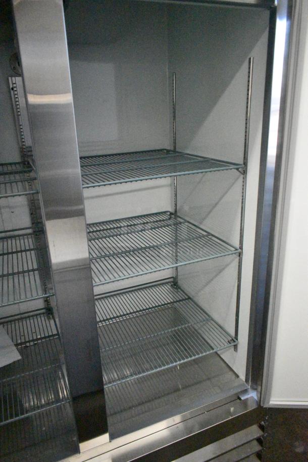 BRAND NEW SCRATCH AND DENT! 2024 Avantco 829BMR49R Stainless Steel Commercial 2 Door Reach In Cooler w/ Poly Coated Racks. 115 Volts, 1 Phase. Tested and Working! - Image 4 of 6