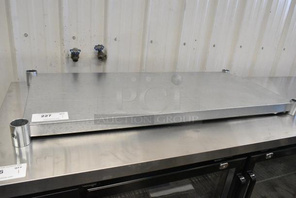 BRAND NEW SCRATCH AND DENT! Metal Under Shelf. - Image 1 of 3