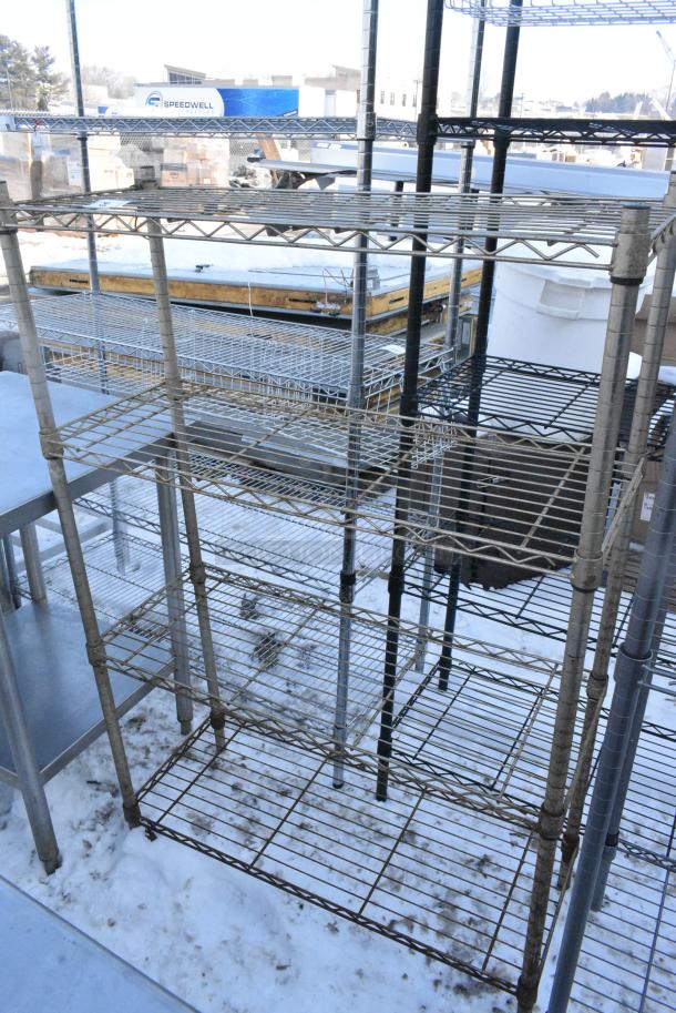 Chrome Finish 4 Tier Wire Shelving Unit. BUYER MUST DISMANTLE. PCI CANNOT DISMANTLE FOR SHIPPING. PLEASE CONSIDER FREIGHT CHARGES. - Image 1 of 3