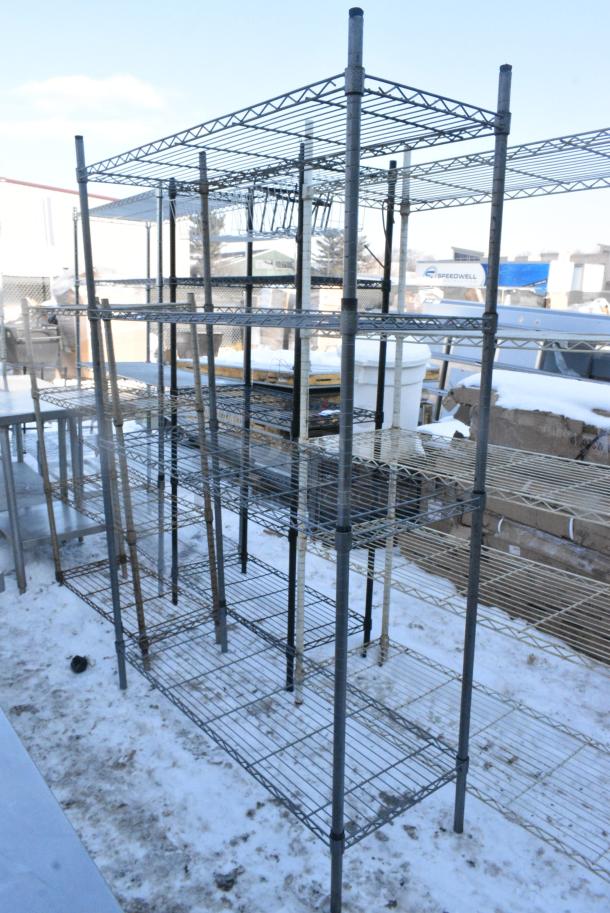 Gray Finish 4 Tier Wire Shelving Unit. BUYER MUST DISMANTLE. PCI CANNOT DISMANTLE FOR SHIPPING. PLEASE CONSIDER FREIGHT CHARGES. - Image 1 of 4
