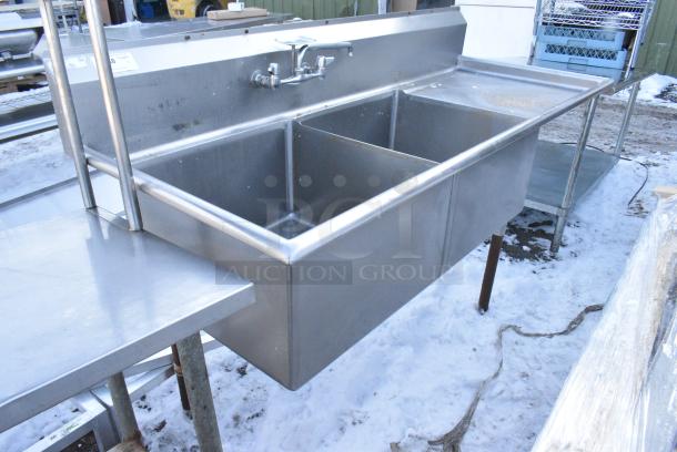 Stainless Steel 2 Bay Sink w/ Right Side Drain Board, Faucet and Handles. 1 Leg Needs To Be Reattached. - Image 1 of 6