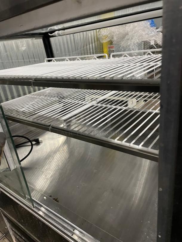 Leader Commercial Stainless Steel Straight Glass 48" Dry Bakery Display Showcase! With Poly Coated Wire Tier Racks! With Lighting! With Rear Access Sliding Glass Doors! Model: CBK48 D SN: GA05C1072! 115V 1 Phase! - Image 5 of 9