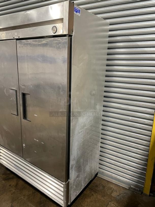 True Commercial Stainless Steel Solid 2 Door Reach In Freezer! With Poly Coated Wire Racks! Model: T-49 SN: 1-3548796! 115V 1 Phase! On Casters! - Image 2 of 9